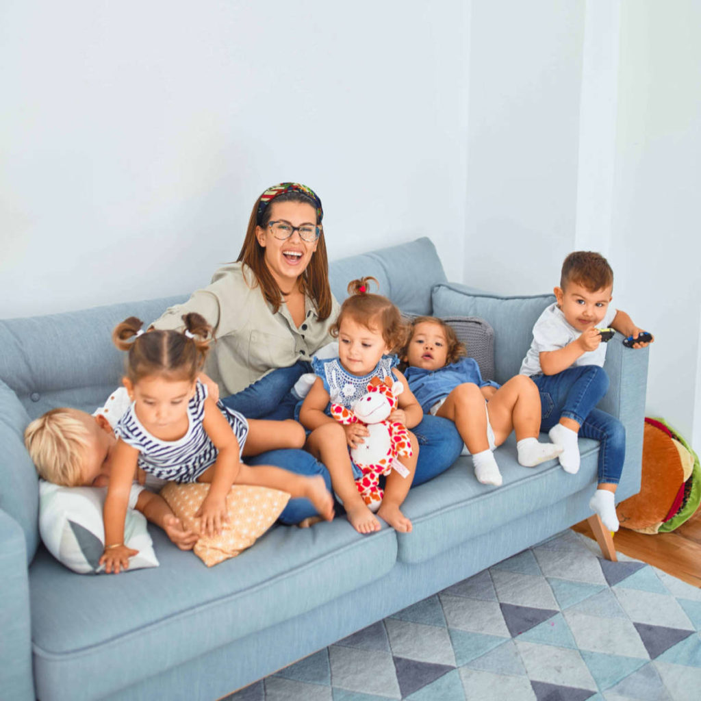 Teacher with ECE Students on a Couch